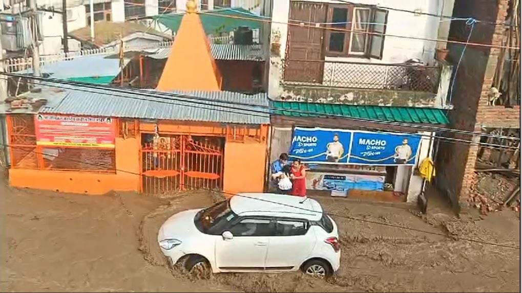 Video: Girl Rescued From Car Stuck In Flood Waters Amid Rain In Uttarakhand