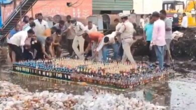 Video: Cops Try To Destroy Liquor Bottles With Bulldozer, Locals Steal Them