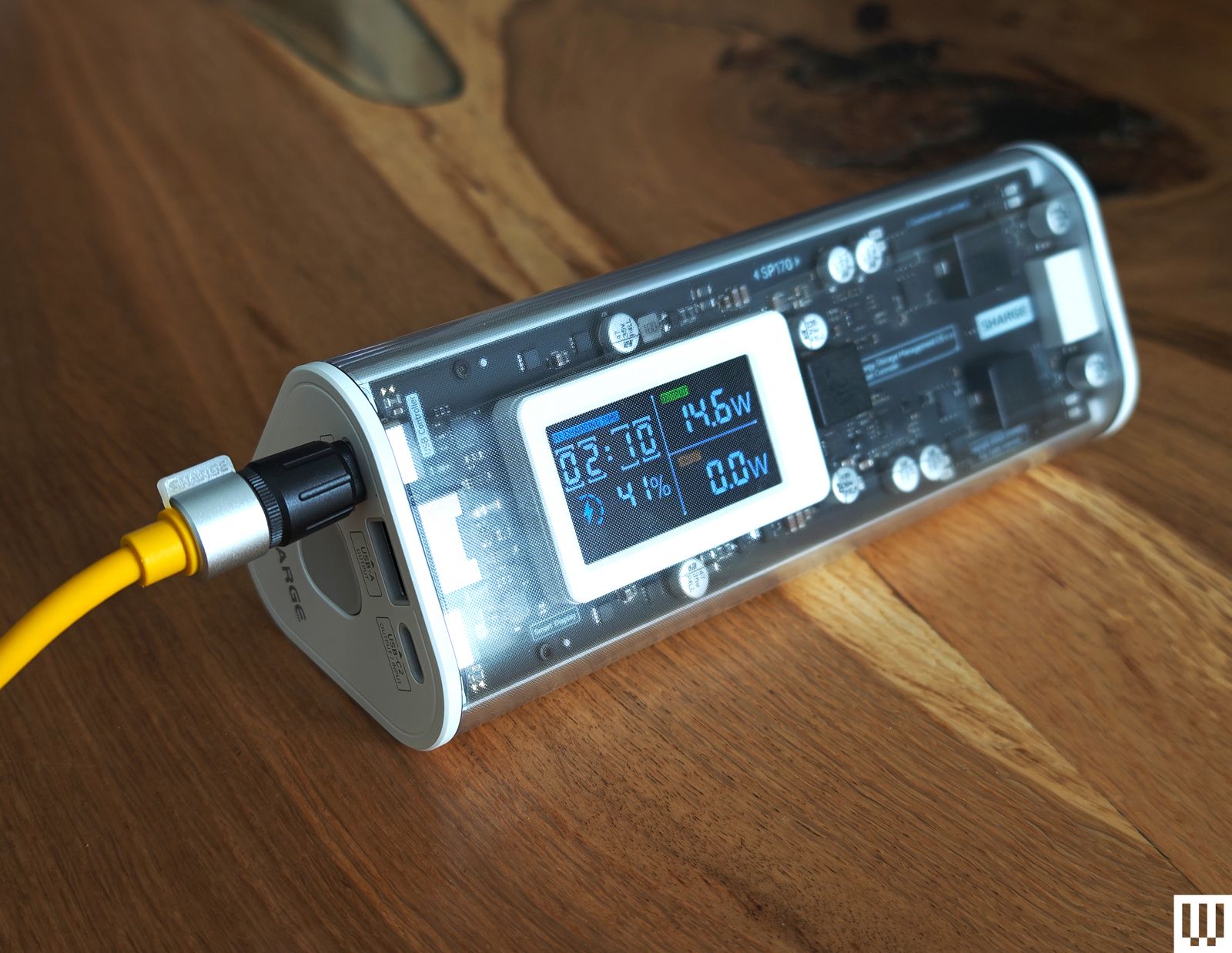 The Shargeek 170 is a long tubeshaped device with clear case that shows the internal pieces and has an external facing...