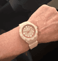 Image may contain Wristwatch Arm Body Part and Person
