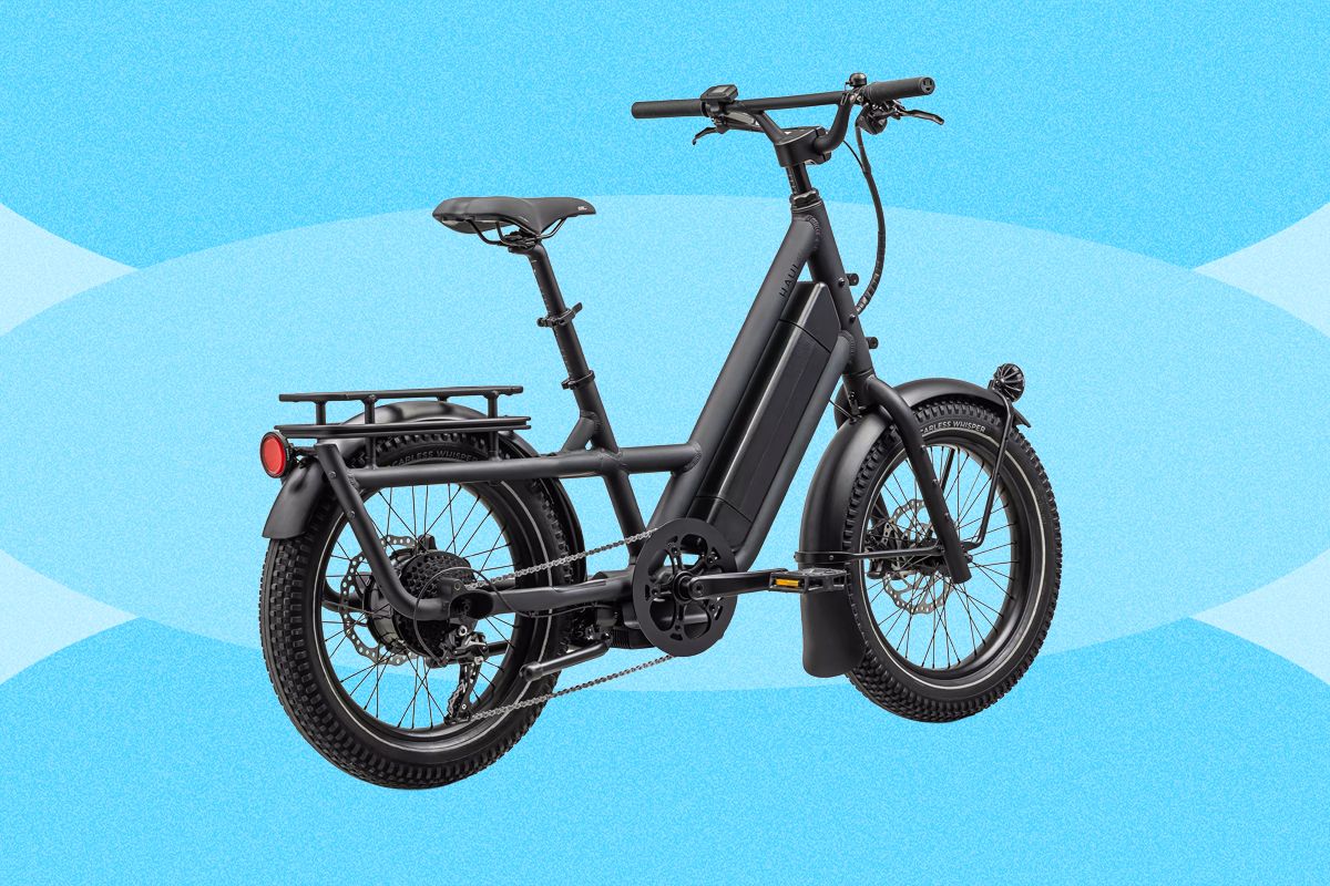 Image may contain Moped Motor Scooter Motorcycle Transportation Vehicle Machine Wheel and Bicycle