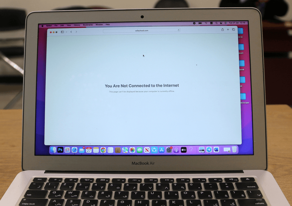 A photo of a laptop screen says the user is offline.