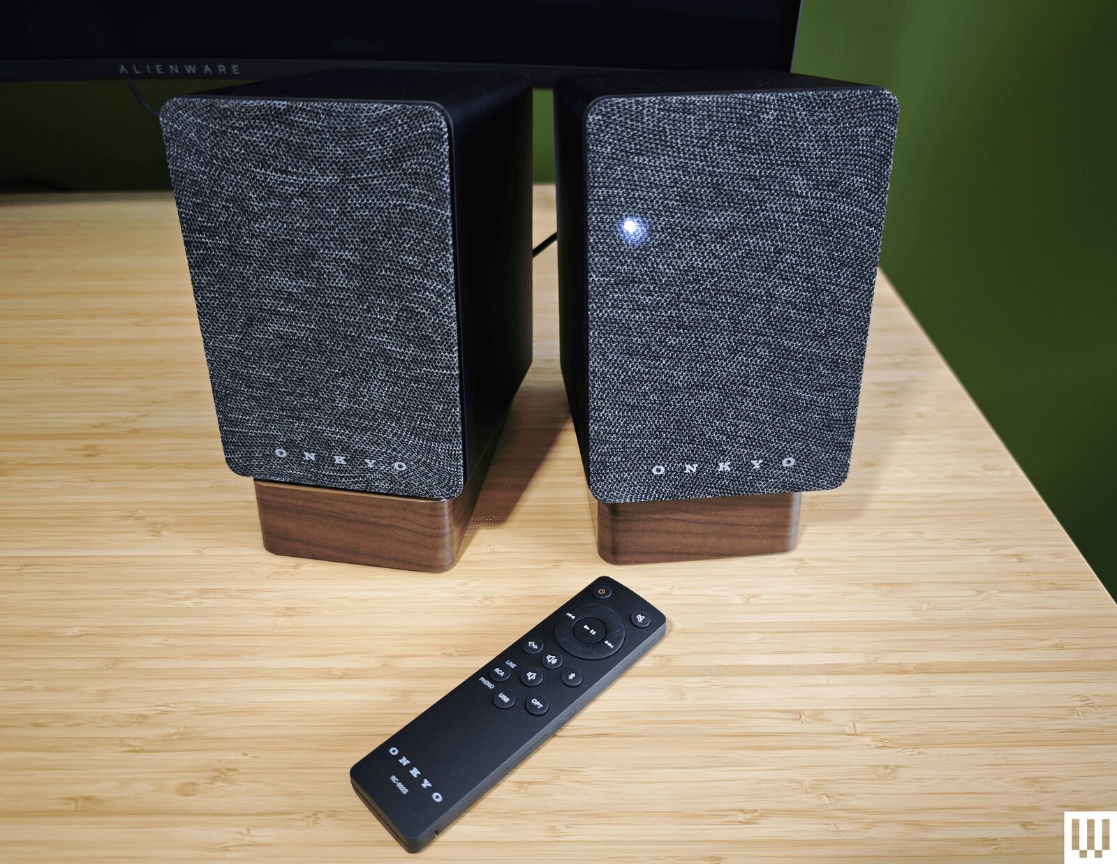 Image may contain Electronics Remote Control and Speaker