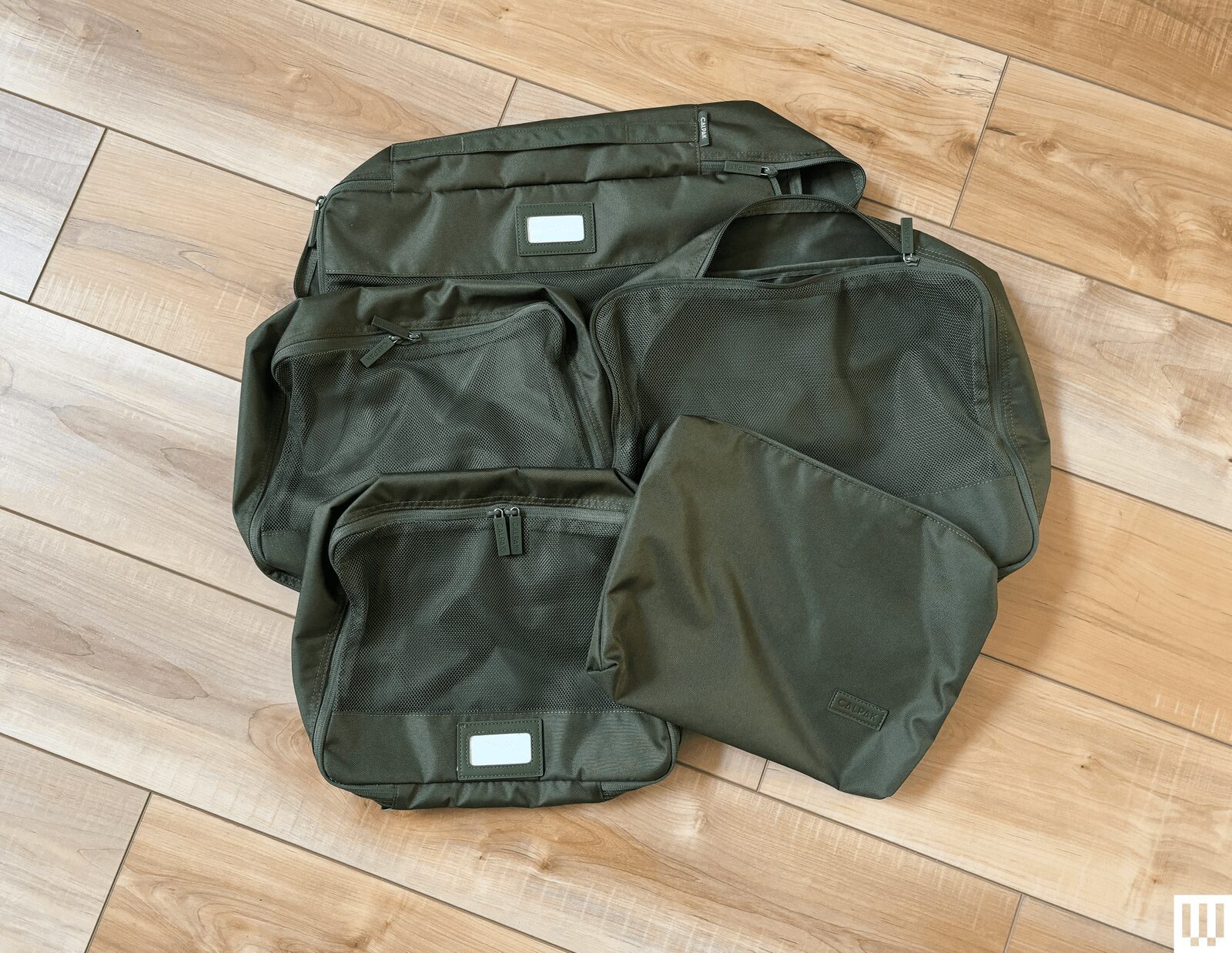 Image may contain Clothing Vest Coat Jacket Accessories Bag and Handbag