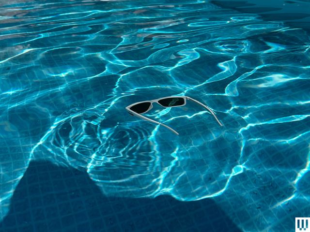 Image may contain: Pool, Water, Leisure Activities, Person, Sport, Swimming, Water Sports, Swimming Pool, Outdoors, and Land