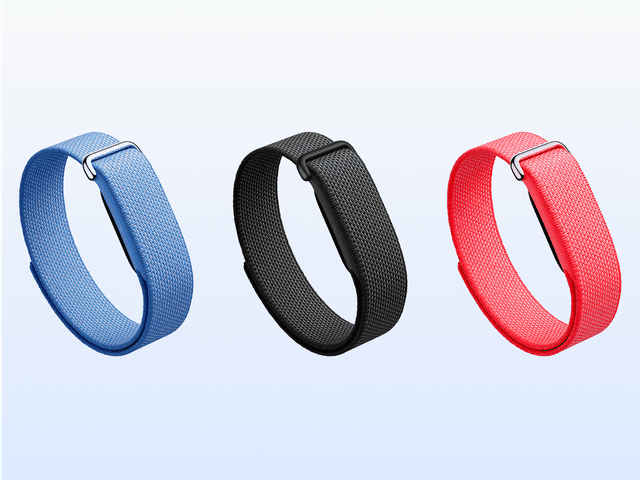 Four wristbands for smartwatch, side by side, in blue, black, pink, and green