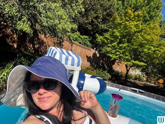 Image may contain: Summer, Accessories, Sunglasses, Face, Head, Person, Photography, Portrait, Plant, Potted Plant, and Pool