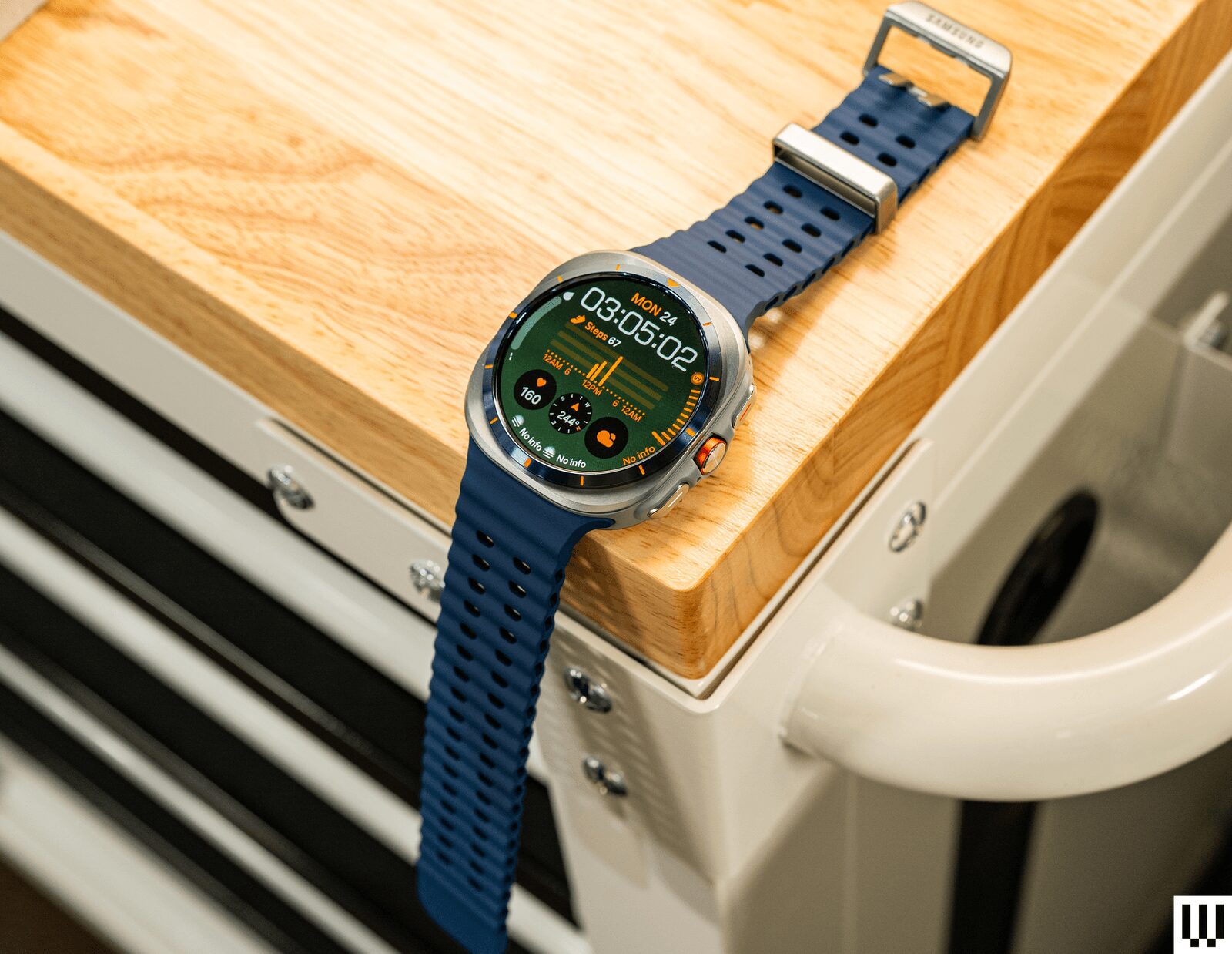Image may contain Wristwatch Arm Body Part Person Blade Razor Weapon Wood Electronics Screen and Computer Hardware