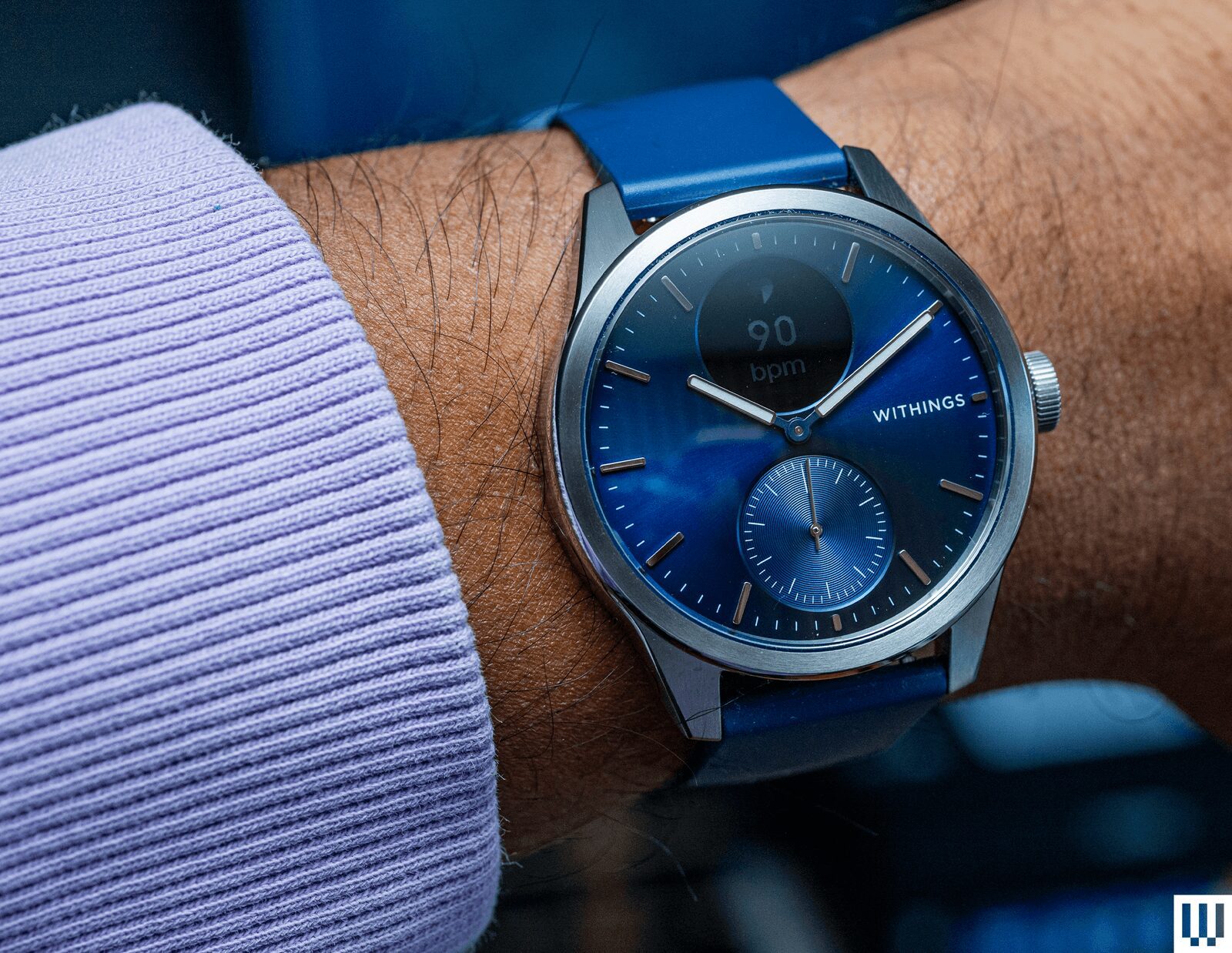 Image may contain Wristwatch Arm Body Part and Person