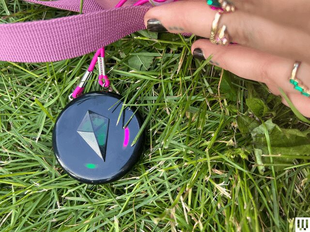 Image may contain: Accessories, Grass, Plant, Baby, Person, Jewelry, Body Part, Finger, and Hand