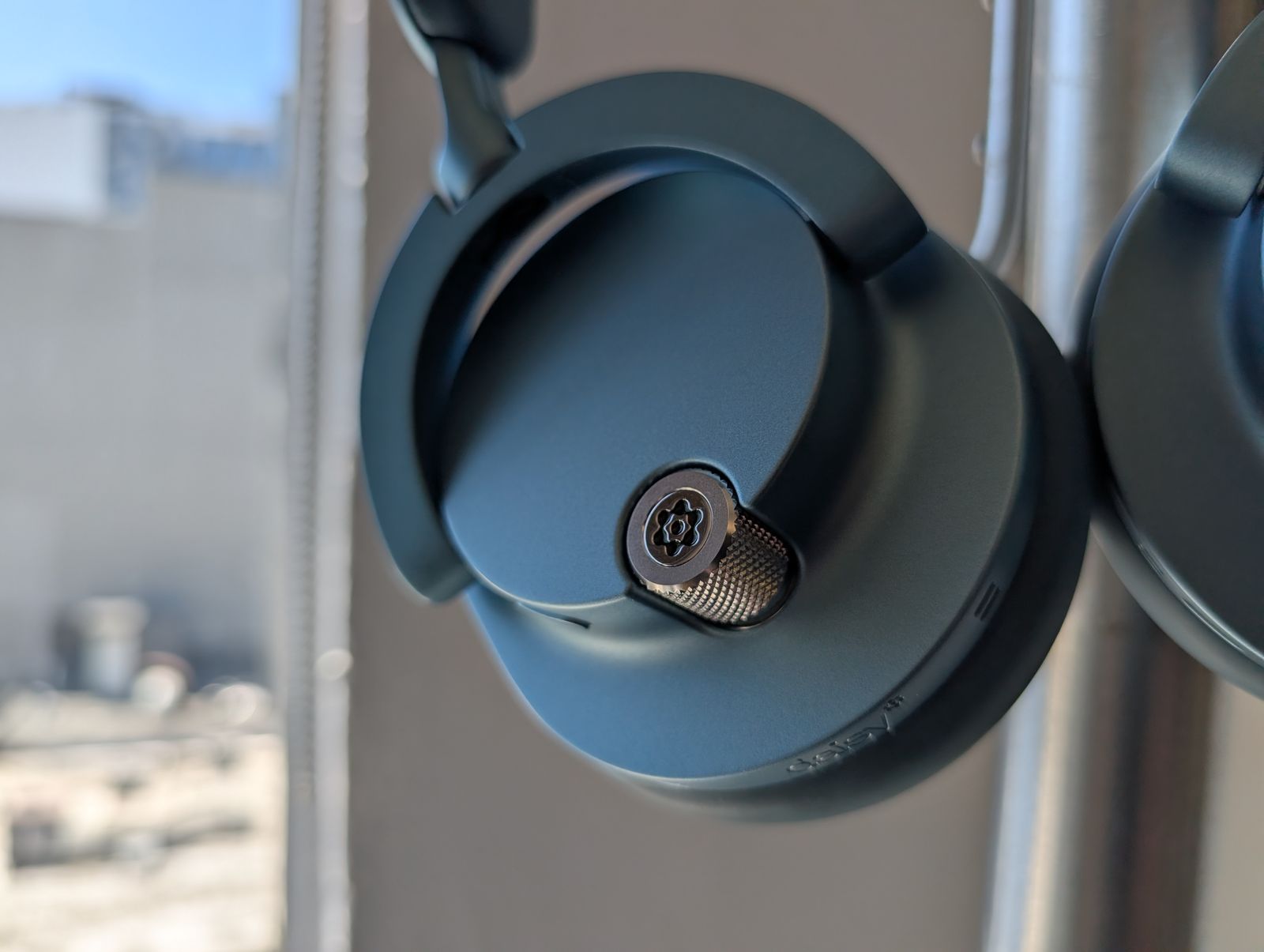 Image may contain Electronics and Headphones
