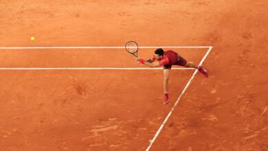 Novak Djokovic playing a backhand at Roland-Garros in May 2024, archive photograph