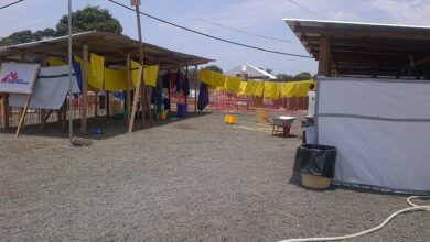 An Ebola treatment unit with controlled zones and protective equipment