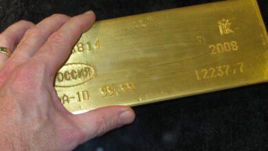 A stack of gold bullion bars