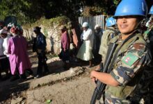 A United Nations peacekeeper providing security to civilians in Kenscoff, Haiti