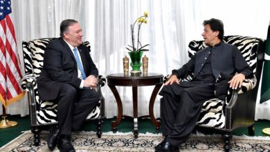 Former Pakistan prime minister Imran Khan seated during an official meeting