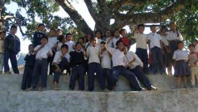A group of schoolchildren standing together outdoors in Palpa Nepal