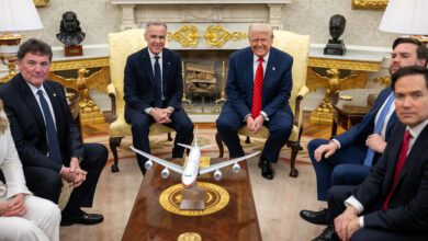 U.S. President Donald Trump seated with Canadian Prime Minister Mark Carney in the Oval Office