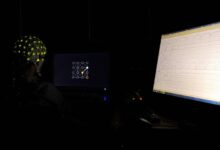 Participant using a brain-computer interface in an experiment