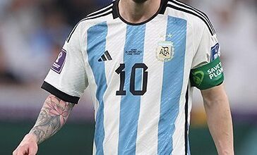 Lionel Messi playing for Argentina at the 2022 FIFA World Cup, archive photograph