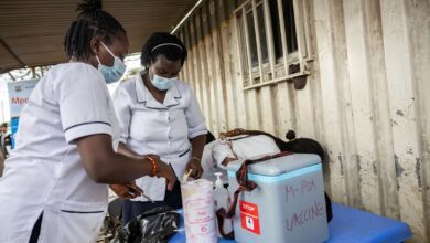 A health worker administers an mpox vaccine during a vaccination campaign in Kenya