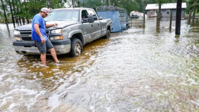 Floodwater covers a road during severe weather in Texas