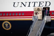President Donald Trump disembarks Air Force One at Ellington Field in Houston, Texas.